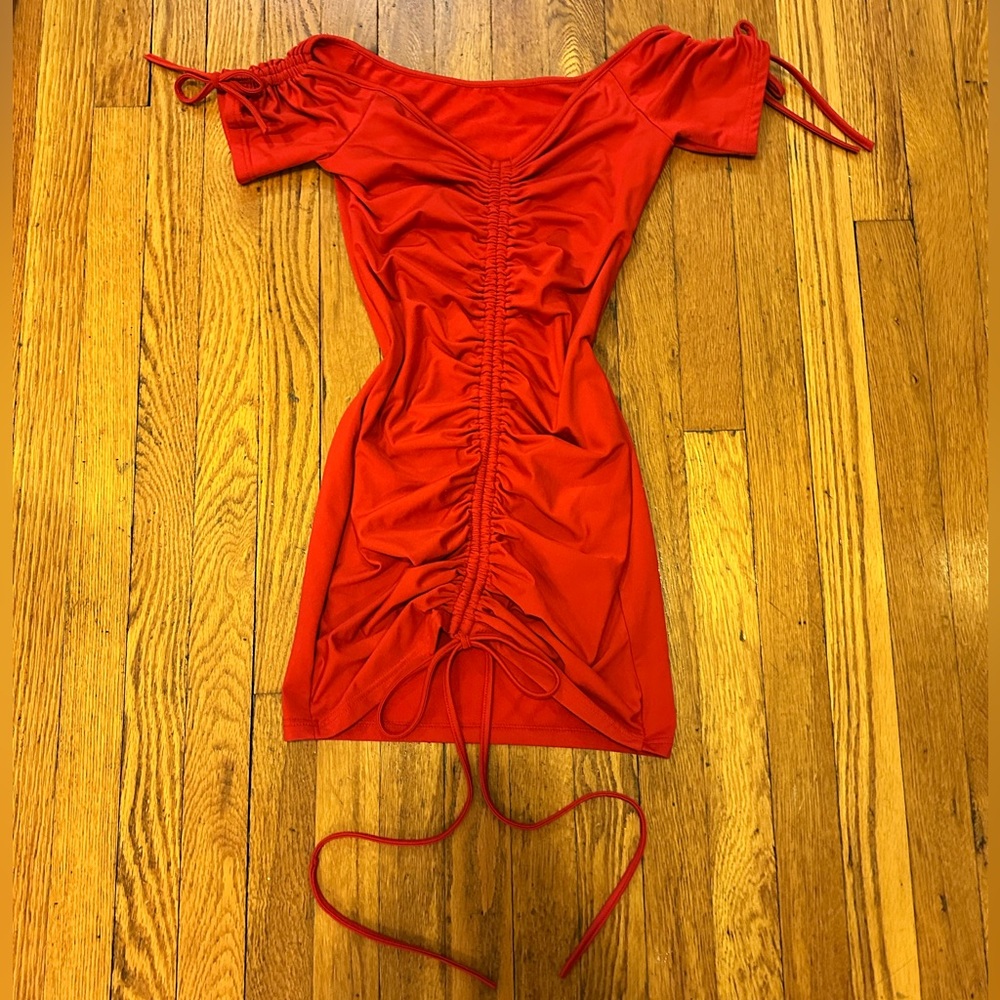 Red ruched mini dress with adjustable straps!
